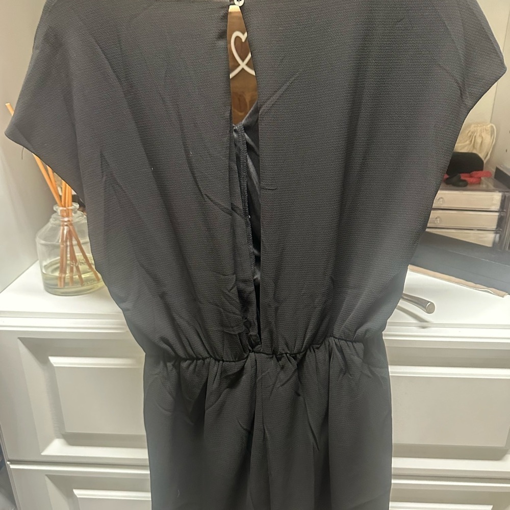 She & Sky Black V-Neck Tie-Front Romper with an open back. - Picture 6 of 7